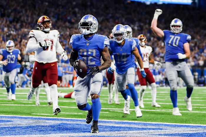 Detroit Lions running back D'Andre Swift celebrates a touchdown against the Washington Commanders during the second half at Ford Field, Sept. 18, 2022.